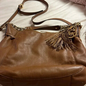 - Michael Kors shoulder bag in tan calf leather backpack
